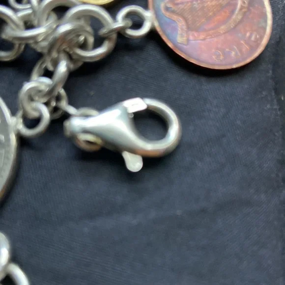 925 sterling silver coin charm bracelet 11 of them on here milor bracelet